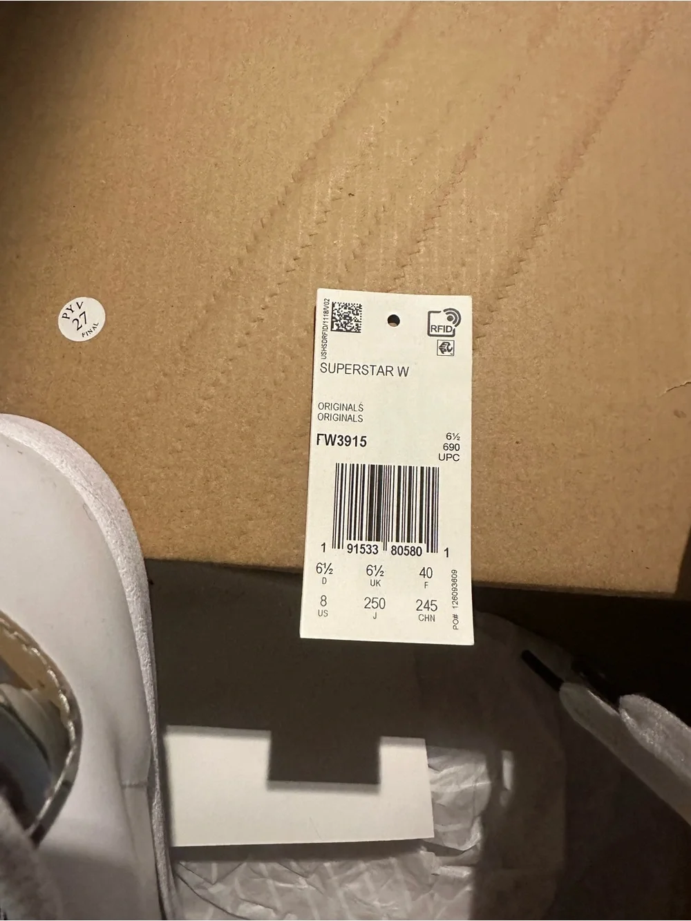 adidas Women’s Superstar Sneakers in White with Silver Stripes